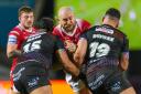 Gil Dudson made his second Salford Red Devils debut against Wigan Warriors having re-joined on a season-long loan from Warrington Wolve
