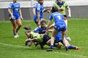 Dani Bound scores during the Women's Challenge Cup loss to Leeds Rhinos
