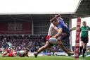 Matty Ashton takes flight to score against St Helens