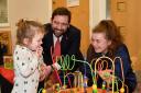 David Baines, leader of St Helens Council, visiting a children's centre