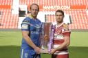 Chris Hill and Wigan stand-in captain Matty Smith with the Super League trophy. Picture by Mike Boden