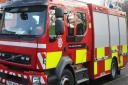 A car fire led to a road closure in Widnes on Saturday morning (April 16)