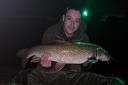 Mike Chris with one of the four barbel he caught while fishing the River Ribble
