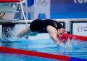 Kathleen Dawson starts the 100m backstroke final. Picture by PA Wire