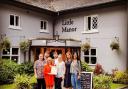 The management team at Little Manor with the North Cheshire CAMRA Pub of the Year award