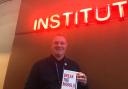Tim Roberts with his new book