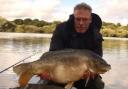 Phil Brown with the 21lb mirror carp he caught at Appleton Reservoir