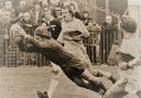 1. Who is this Wire player diving over for a try against Hull KR?
Answer: Ken Kelly