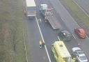 Lanes closed and queues building following crash on M56