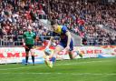 Josh Thewlis touches down the first of five tries Warrington Wolves scored at St Helens on Sunday