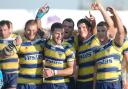 Woody, left, and his Wolves teammates celebrate victory in the Challenge Cup quarter final at Hull KR.