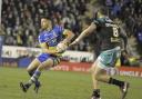 Dec Patton on the attack for Warrington Wolves against Leeds Rhinos. Picture: Mike Boden