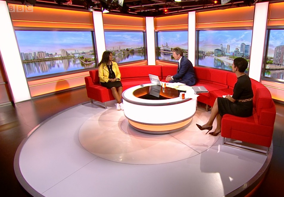 Thara Raj in the BBC Breakfast studio alongside presenters Charlie Stayt and Naga Munchetty (Image: BBC)