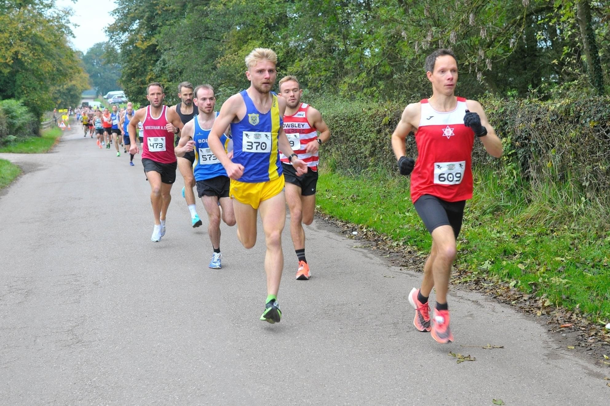 Chris Stanford leads a group at the Cheshire 10k. Picture by RunThrough Cheshire