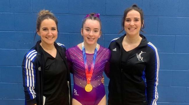 Jess Adamson with Warrington Gymnastics Club coaches Sophie and Hannah Whelan