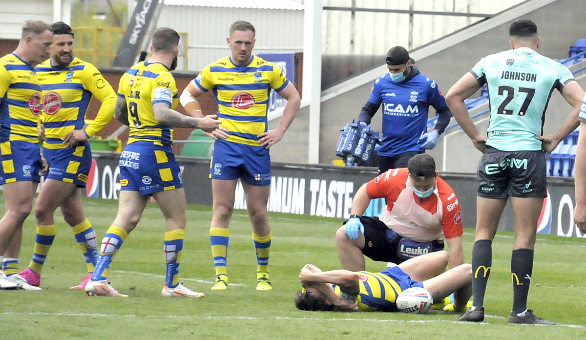 Matty Ashton lies stricken on the turf against Hull KR last year having suffered the serious ankle injury that took out much of his season. Picture by Mike Boden