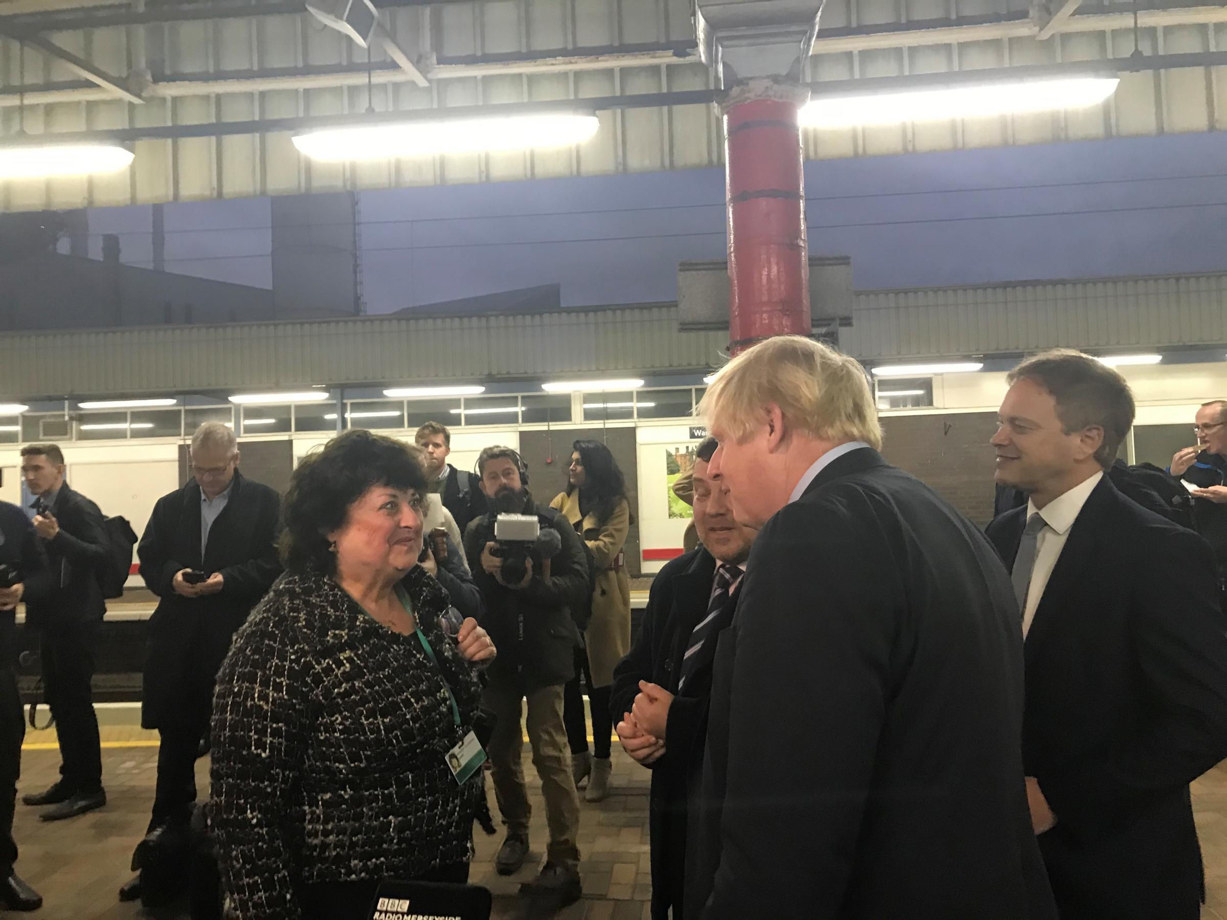 Mr Johnson spoke with Cllr Kath Buckley and Andy Carter MP at Bank Quay station