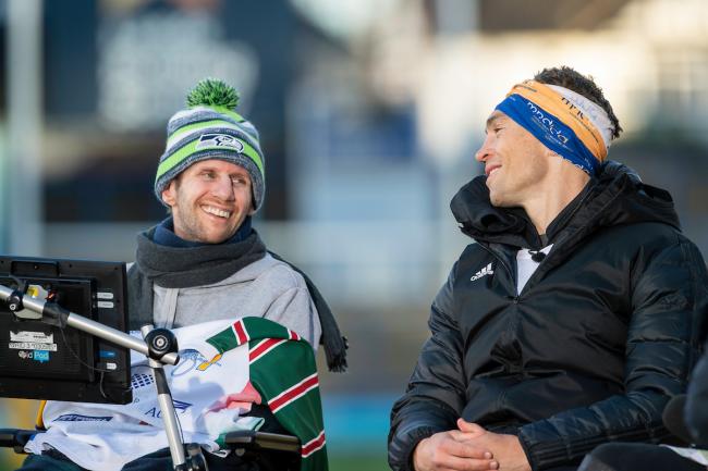 Kevin Sinfield, right, with Rob Burrow after completing his Extra Mile Challenge of 101 miles in under 24hrs. Pic: SWpix.com