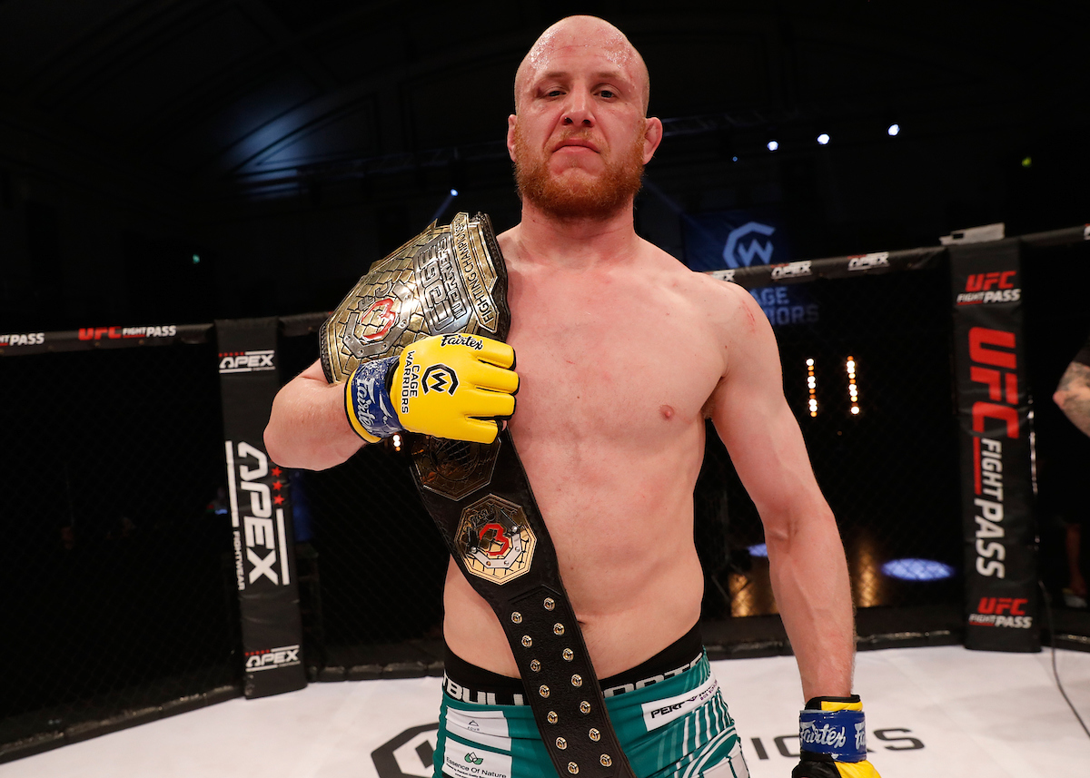 Matt Bonner with the Cage Warriors world middleweight title he won in June. Picture by Dolly Clew