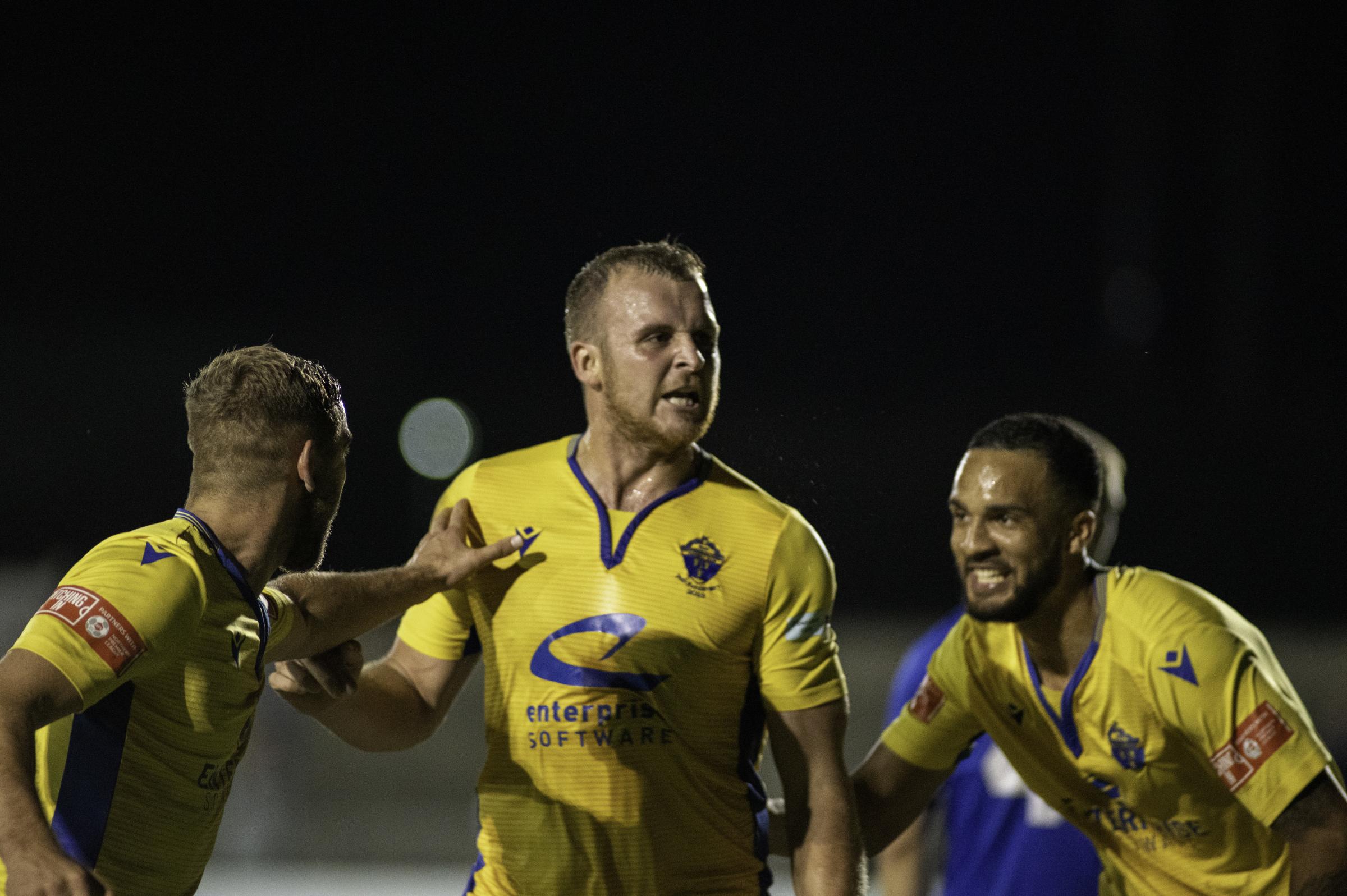 Josh Amis celebrates scoring the winner when Yellows won 1-0 at Lancaster City in September. Picture by Karl Vallantine