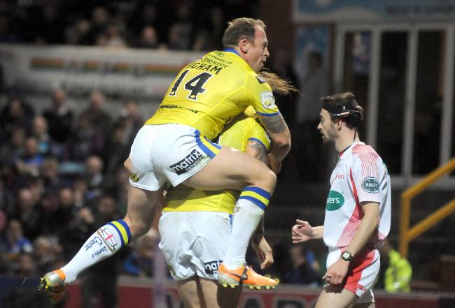 A Warrington Wolves try being celebrated at Leeds in 2015, but who is the scorer? Picture: Mike Boden
