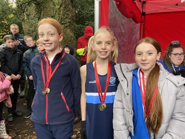 Warrington Guardian: The top three runners in the girls' Year 6 league