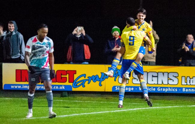 Jordan Buckley and Stefan Mols celebrate after the latter set up the former to score against Radcliffe. Picture by Karl Vallantine