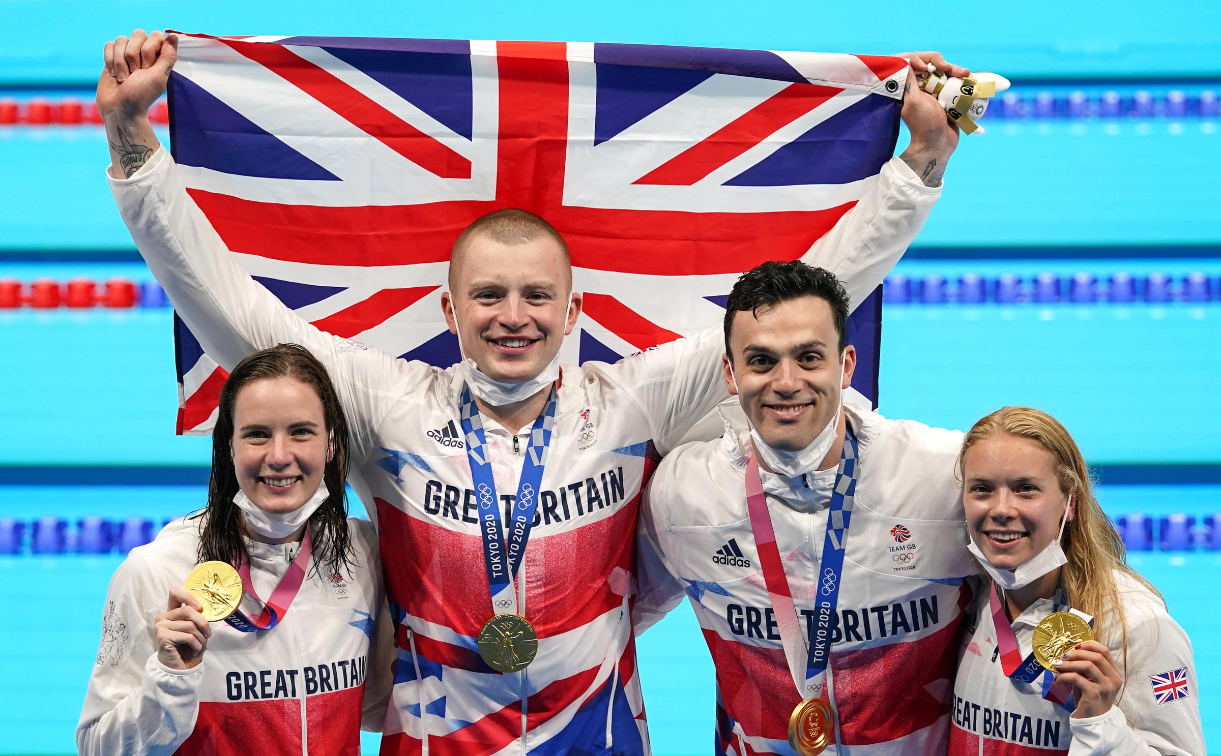 Kathleen Dawson, Adam Peaty, James Guy and Anna Hopkin with their gold medals for the mixed 4 x 100m medley relay (Image: PA)