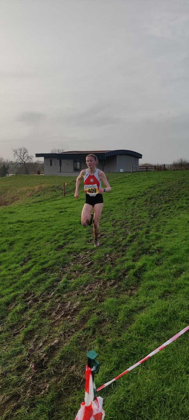 Warrington Guardian: Ellen Turnbull navigates a slope in the 2022 Cheshire Cross Country Championships