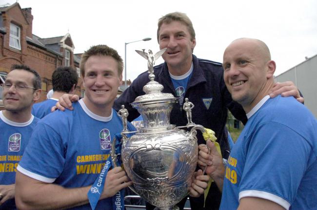 Richard Marshall, left, with the Challenge Cup trophy in 2009 during his previous spell with Warrington Wolves. Picture by Mike Boden