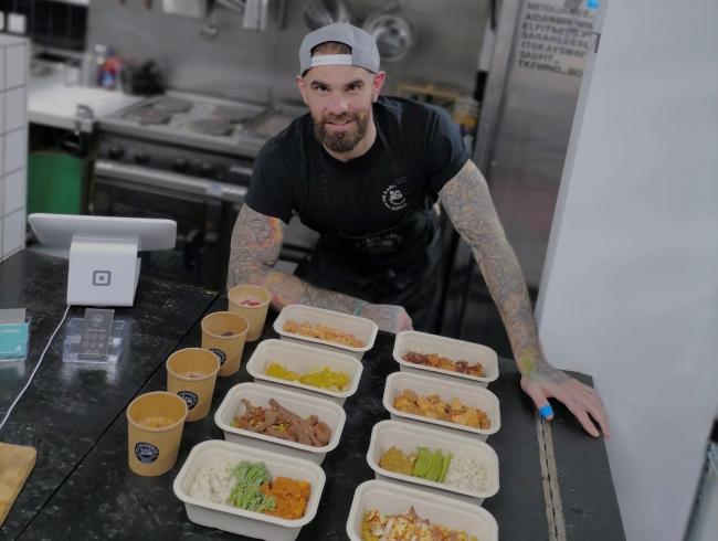Andy Bradburn, of B Balanced Co. Kitchen with the food he offers