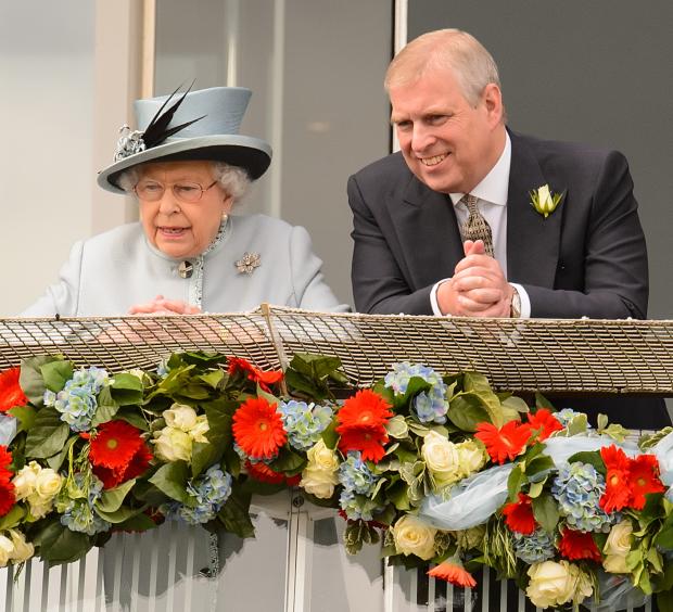 Warrington Guardian: (left to right) Queen Elizabeth II and Prince Andrew. Credit: PA