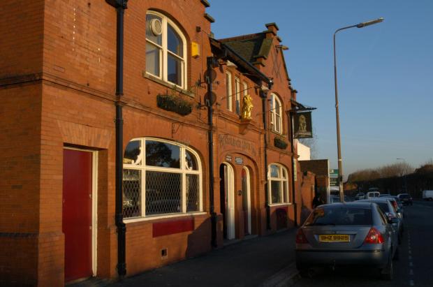 Warrington Guardian: The Golden Lion on Knutsford Road is now used as a furniture store