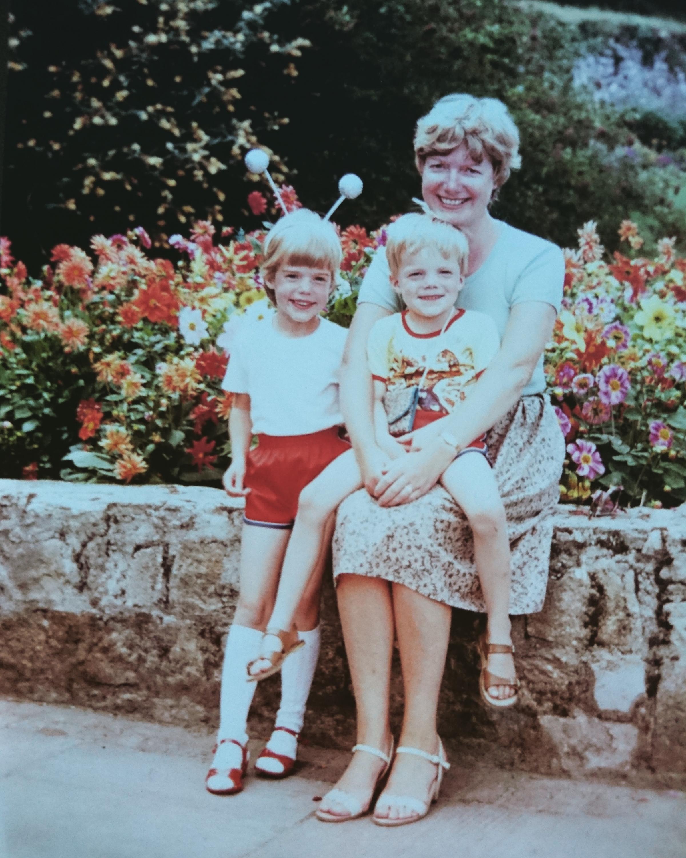 Sam and Andrew Self as kids with their mum, Jacque Self