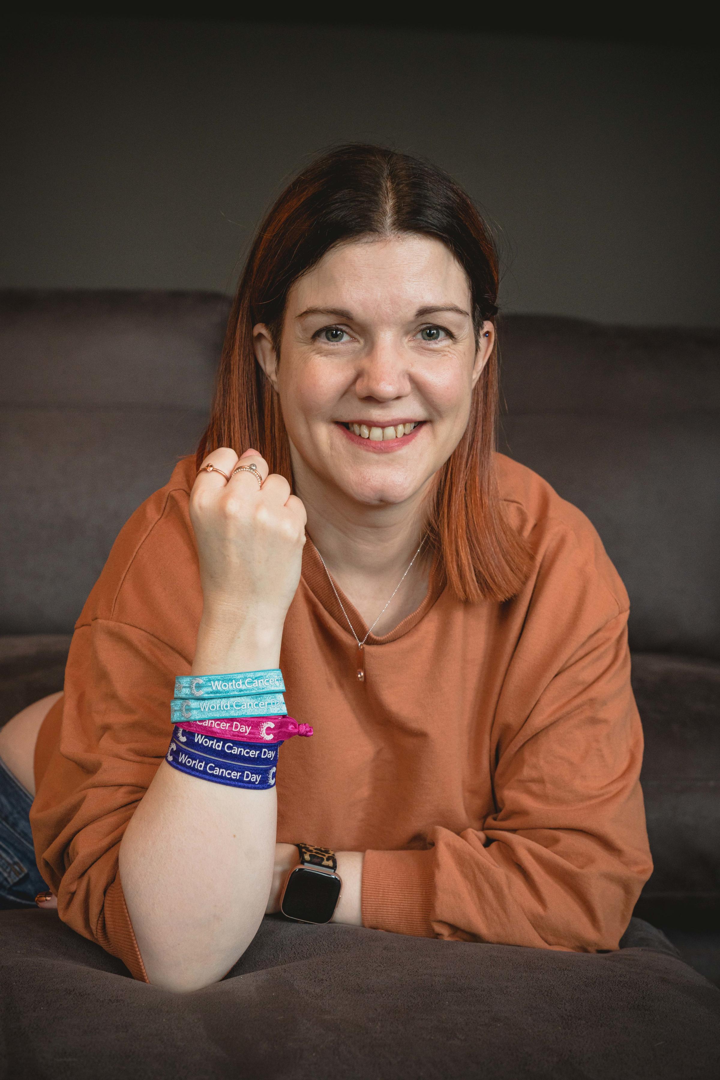 Sam Self is encouraging people to buy and wear a Cancer Research UK Unity Band this World Cancer Day