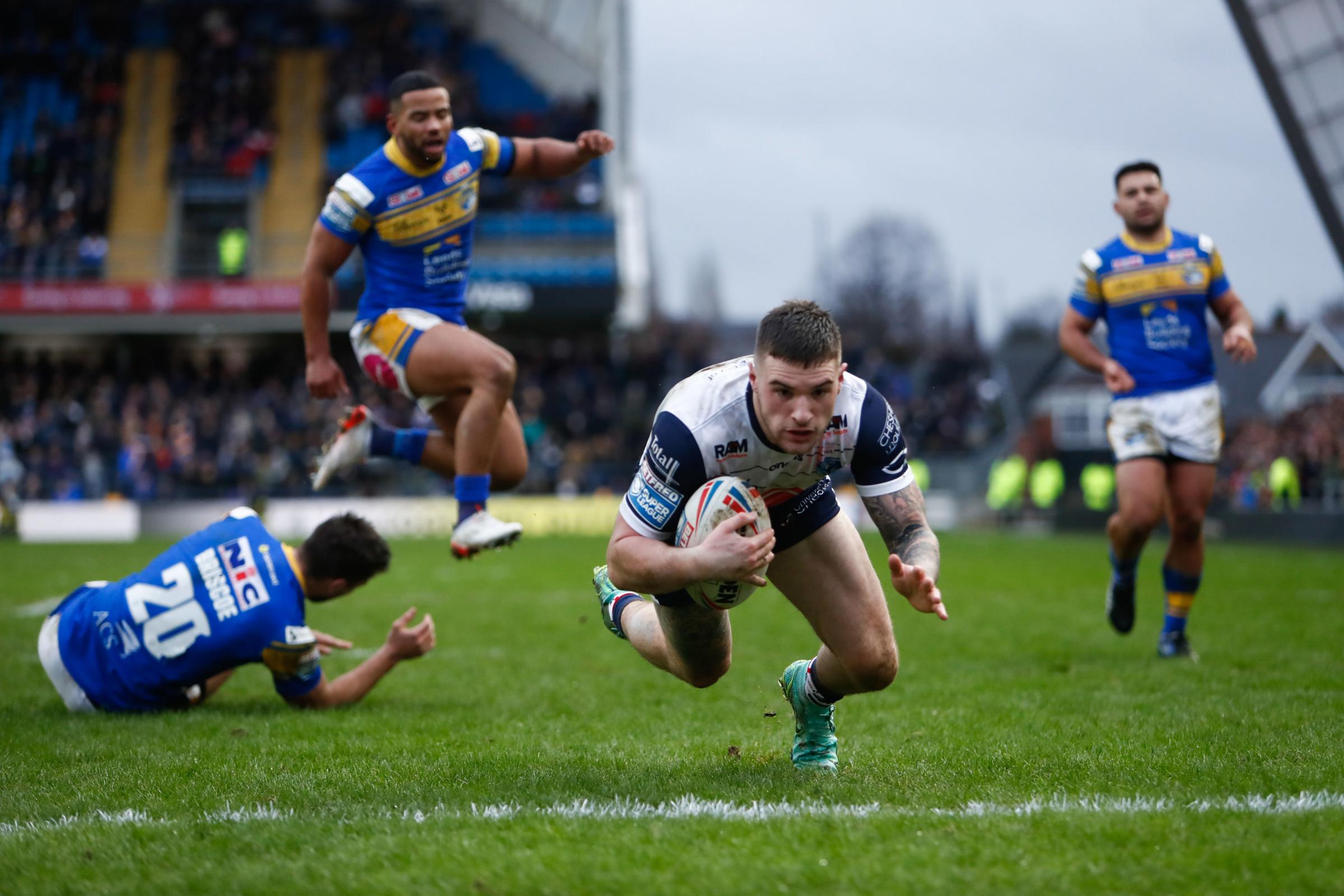 Connor Wrench scores Wires winning try. Picture by PA Wire