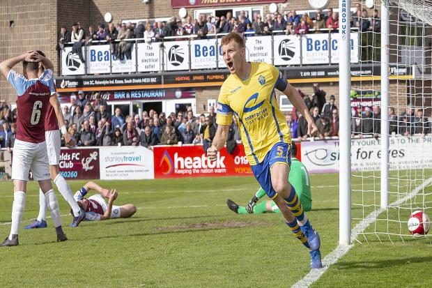 Mark Roberts celebrates the winning goal for Yellows in their 2019 play-off win at South Shields. Picture by John Hopkins