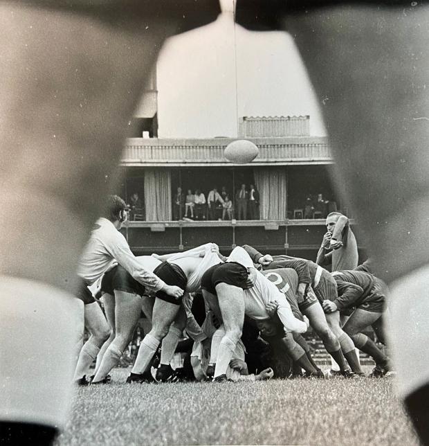 Warrington Guardian: Eddie Fuller called this his 'legs 11' picture, as he captures a scrum collapses as seen through the touch judge's legs in 1972