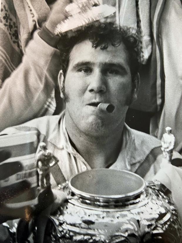 Warrington Guardian: Dave Chisnall lights up a cigar in celebration of winning the Challenge Cup Final at Wembley with Warrington Wolves in 1974