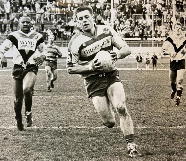 Warrington Guardian: Mark Forster scoring one of his Warrington Wolves interception specials, this one against Bradford Northern at Odsal Stadium