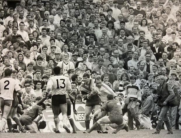 Warrington Guardian: A 1980s brawl between Warrington and Widnes players watched by a packed Naughton Park crowd