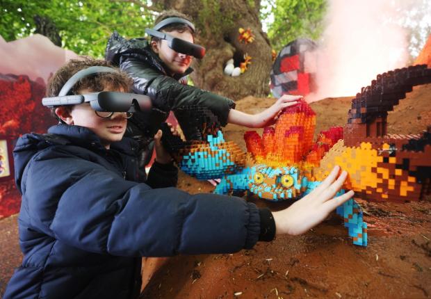 Warrington Guardian: Lucca and Sonny using the eSight eyewear as they explored the Magical Forest (LEGOLAND Windsor)