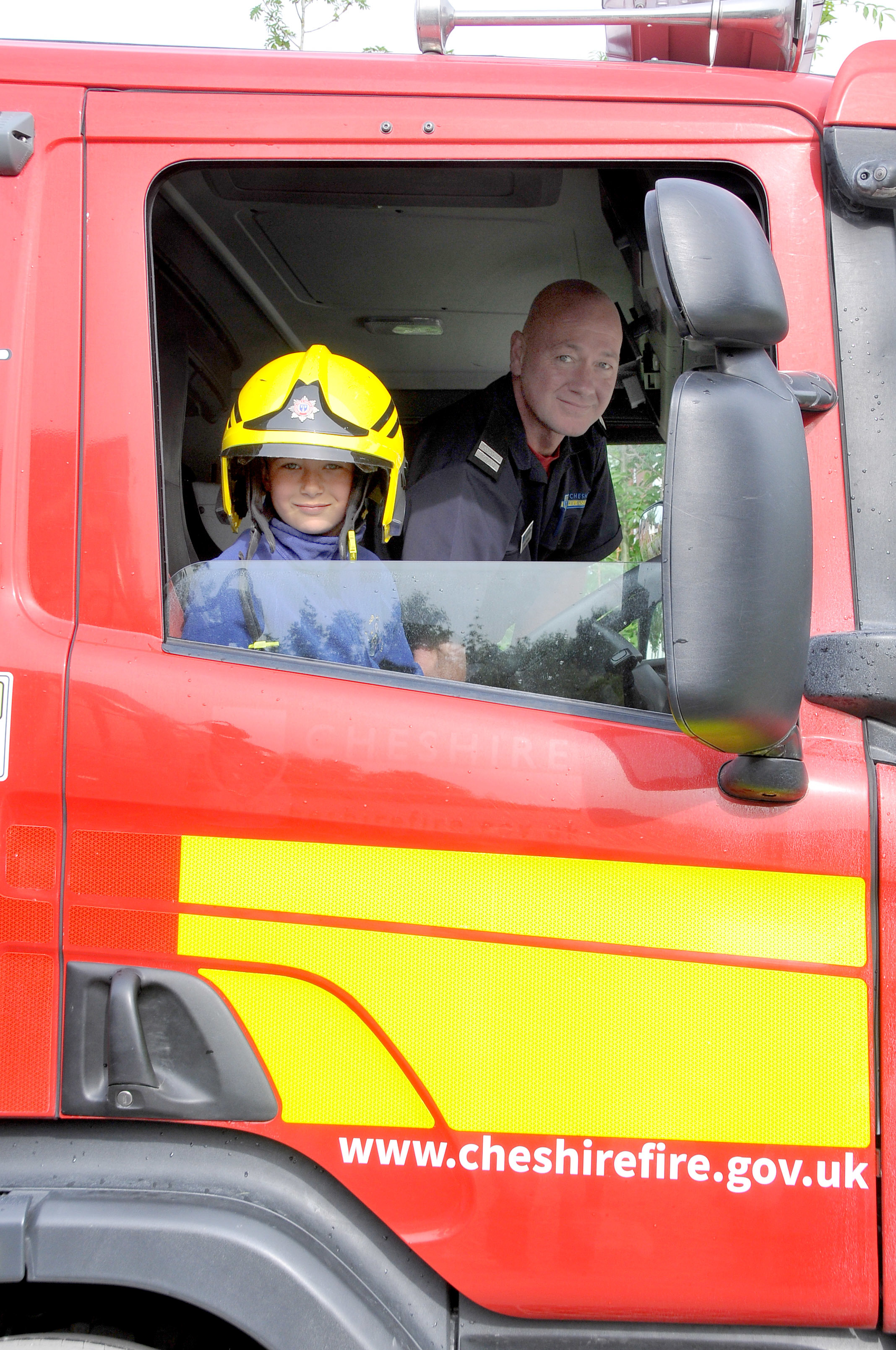 Joel Leicester with firefighter Mark Ralston