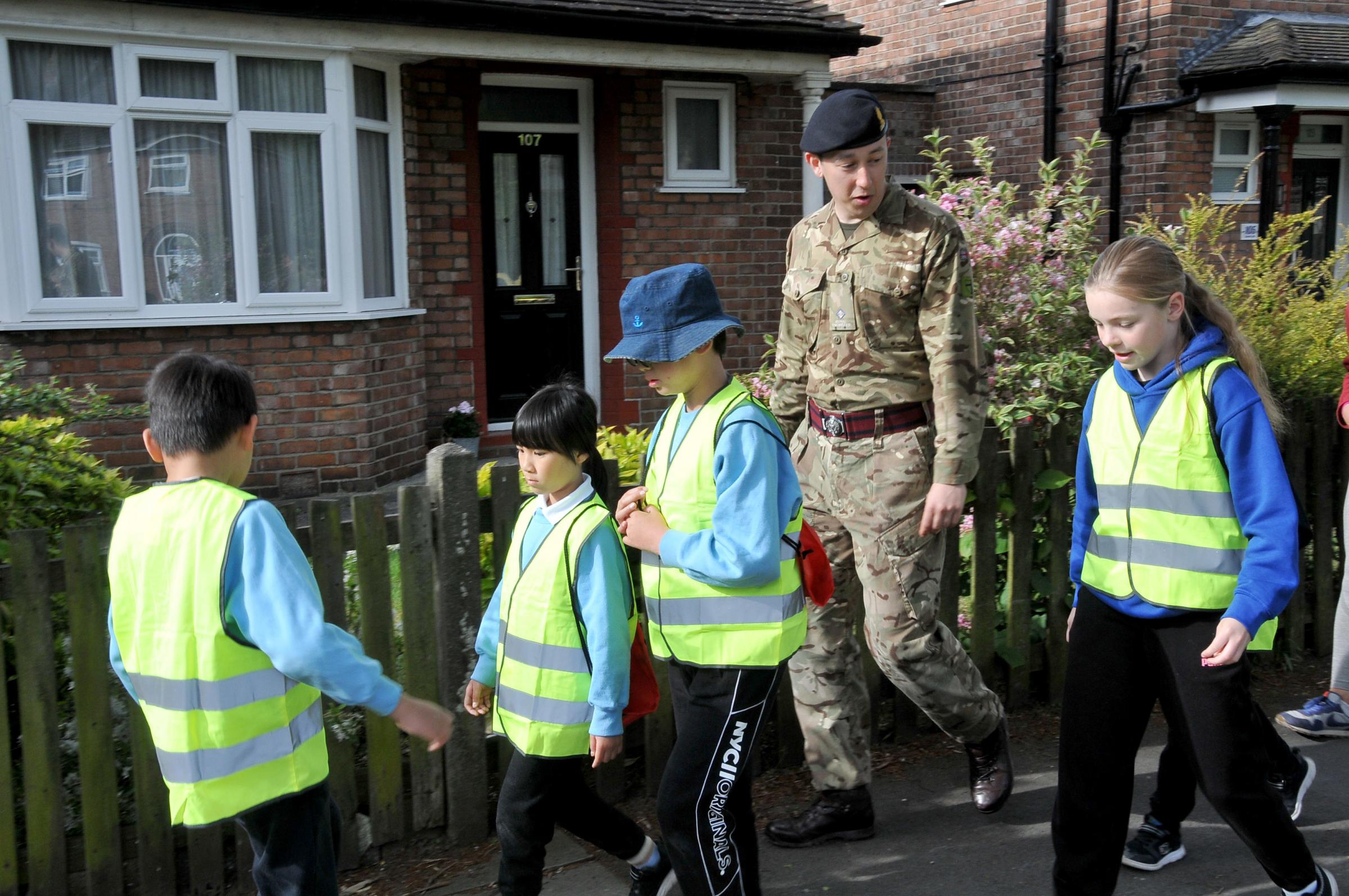 Children picked a hero to walk to school with