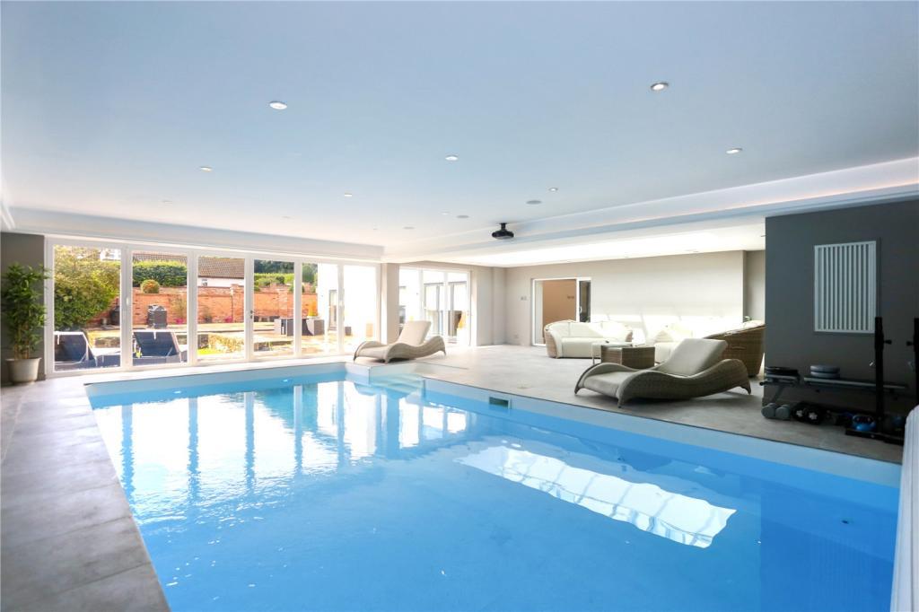 A sizable swimming pool can be found in the house