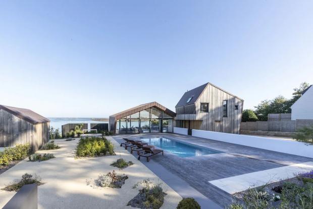 Warrington Guardian: Modern villa with stunning sea views, swimming pool, Jaccuzi - Brittany, France. Credit: Vrbo
