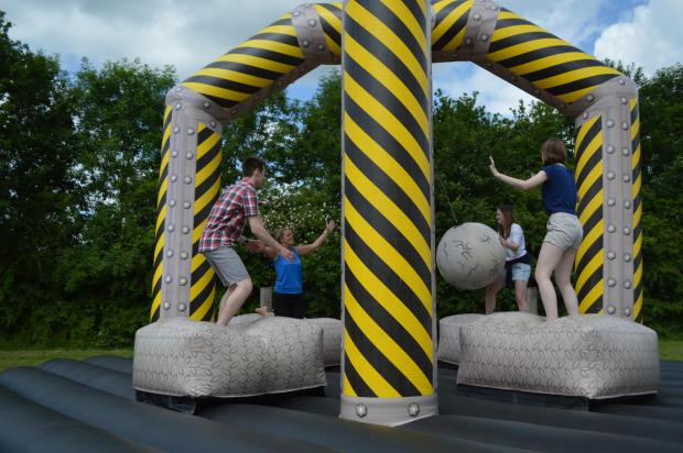 Warrington Guardian: Visitors will be able to try their luck on the Demolition Ball inflatable