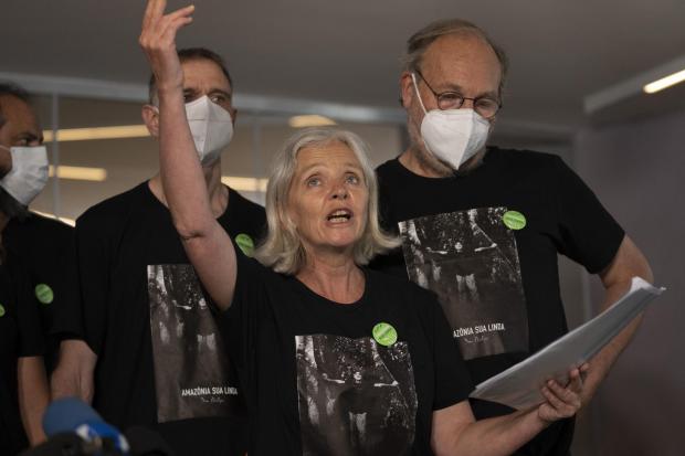 Sian Phillips, sister of late British journalist Dom Phillips, speaks to the media during the funeral of her brother at the Parque da Colina cemetery in Niteroi, Brazil, Sunday, June 26, 2022. Family and friends paid their final respects to Phillips who