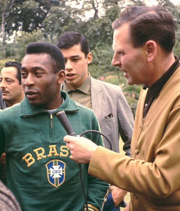 Warrington Guardian: BBC commentator Kenneth Wolstenholme interviews Pele at Lymm Hotel for the 1966 World Cup (Image: Eddie Whitham)