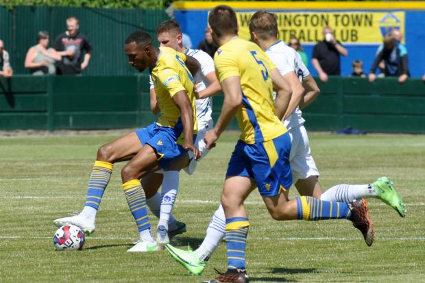 Bohan Dixon on the ball for Warrington Town during Saturday's pre-season friendly against Tranmere Rovers. Picture by Neil Ashurst/P&B Pictures